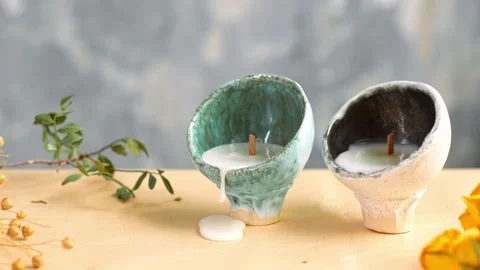 Closeup of candles spreading aroma on table in a spa room. Zen and relax concept Stock Footage 204142257
