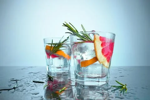 Closeup of a cape cod cocktail or vodka cranberry on a blue background Stock Photos