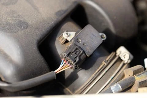 Closeup of a car air flow sensor, highlighting intricate electronic Stock Photos
