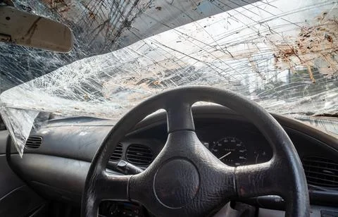 Closeup of in the car with broken windshield steering wheel , Accident of car Stock Photos