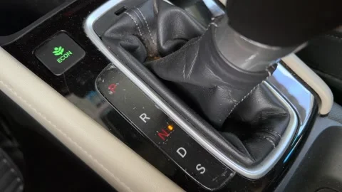 Closeup of Car Gear Shift Changing Driving Mode Inside Modern Vehicle Stock Footage 336701204