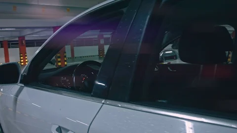 Closeup of car interior front dashboard, underground parking 스톡 동영상 106928950
