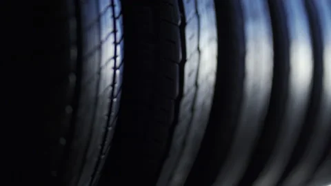 Closeup of car tyres background video Stock Footage 138807296