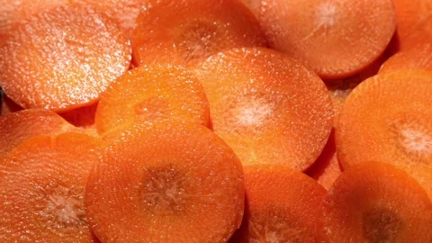Closeup of a carrot on wooden backdrop Video stock 302536611