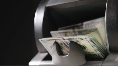 Closeup of cash counting machine counting dollar bills. Business accounting and Stock Footage 231030825