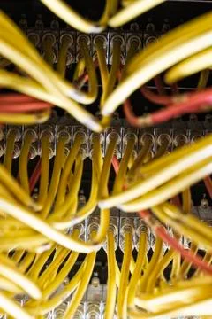 Closeup of  CAT 5 cable bundle system in a computer server room Stock Photos
