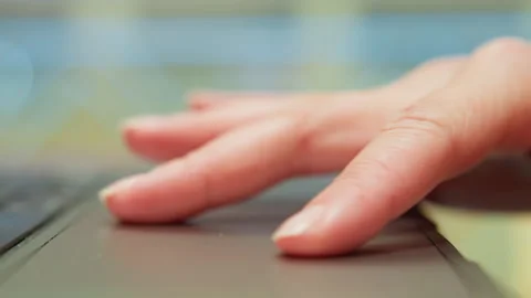 Closeup caucasian hand navigating touchpad for patient records, calm clinical Stock Footage 337365834