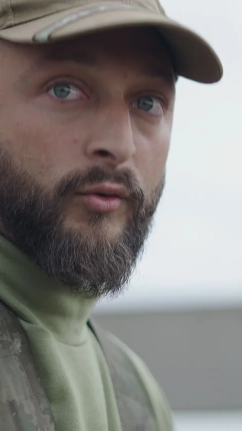 Closeup of a Caucasian hunter commenting on something Stock-Footage 271608929