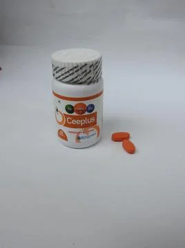 Closeup of Ceeplus Immunity Booster Tablets Plastic Container isolated on whi 스톡 사진