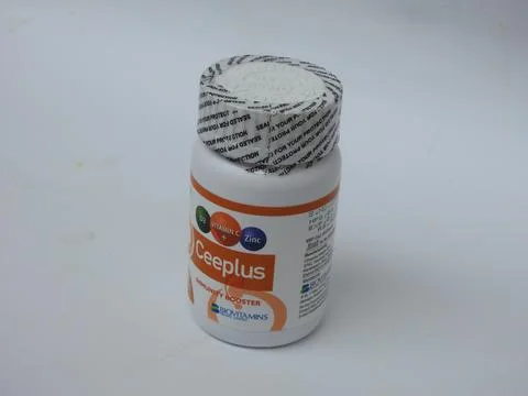 Closeup of Ceeplus Immunity Booster Tablets Plastic Container isolated on whi 스톡 사진