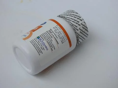 Closeup of Ceeplus Immunity Booster Tablets Plastic Container isolated on whi 写真素材