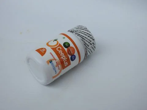Closeup of Ceeplus Immunity Booster Tablets Plastic Container isolated on whi 写真素材