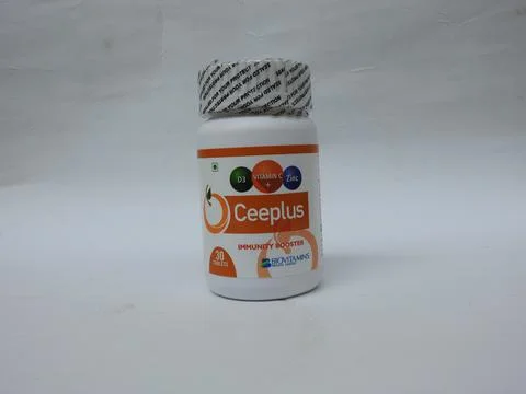 Closeup of Ceeplus Immunity Booster Tablets Plastic Container isolated on whi Foto stock