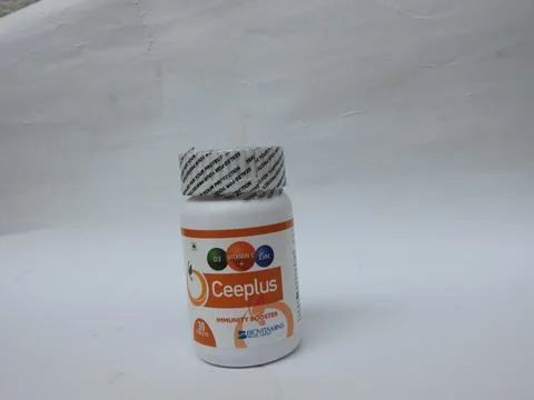 Closeup of Ceeplus Immunity Booster Tablets Plastic Container isolated on whi 스톡 사진