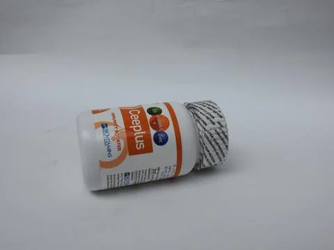 Closeup of Ceeplus Immunity Booster Tablets Plastic Container isolated on whi Foto stock