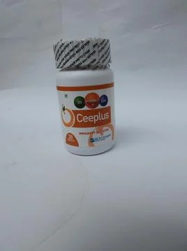 Closeup of Ceeplus Immunity Booster Tablets Plastic Container isolated on whi Фото