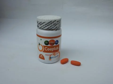 Closeup of Ceeplus Immunity Booster Tablets Plastic Container isolated on whi Foto stock