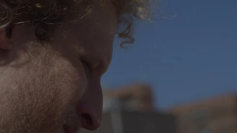 Closeup of cellist face while playing cello in New York City Stock Footage 111045649