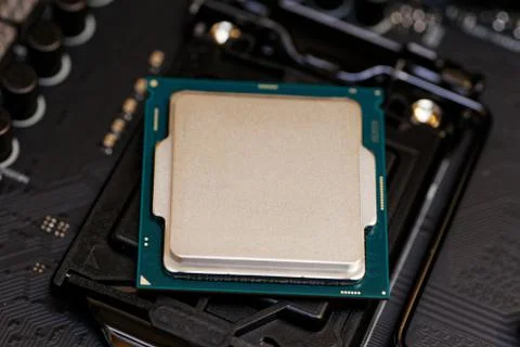 Closeup Central Processor Unit (CPU) ready to install on motherboard. 스톡 사진