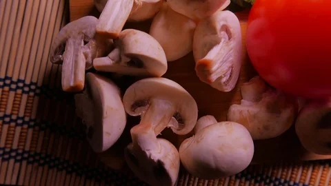Closeup of champignons and vegetables. 4K UHD Stock Footage 73110942