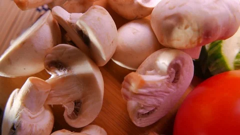 Closeup of champignons and vegetables. 4K UHD Stock Footage 73110969