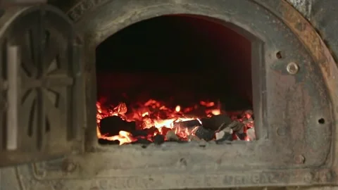 A closeup of charcoal burning inside the factory kiln or industrial fire kiln Stock Footage 240455392