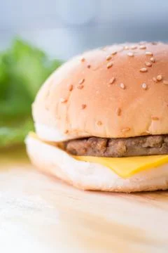 Closeup of a cheese burger Stock Photos