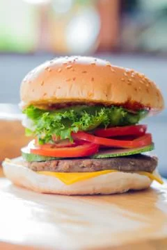 Closeup of a cheese burger Stock Photos