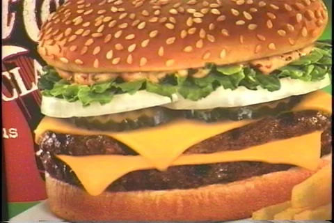 Closeup of Cheeseburger on Restaurant Sign Stock Footage 121604586