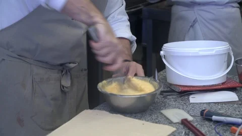 Closeup chef batting eggs with pastry dough Stock-Footage 107545226