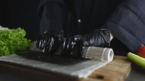 Closeup Of Chef Making Sushi And Slicing A Sushi Roll. Stock Footage 235884476