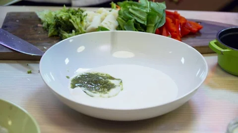 Closeup of chef making tasty sauce in the bowl Stock Footage 77041739