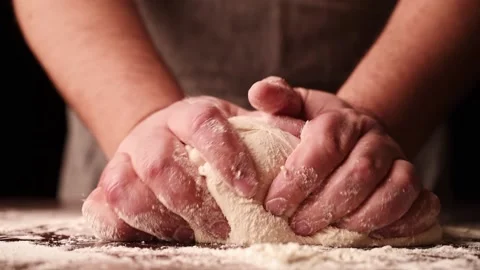 Closeup on chefs hands making dough at kitchen. Pastry process close up 스톡 동영상 150055760