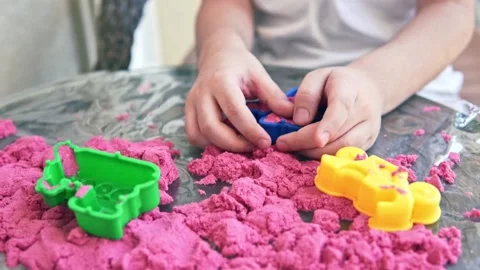 Closeup of child's hands playing in kinetic sand 스톡 동영상 161143779