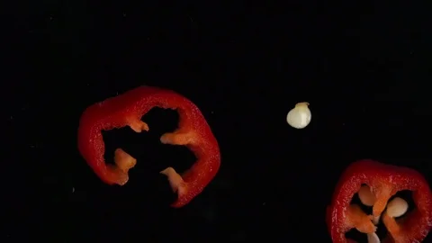 Closeup of chilly peppers falling onto surface. Cooking background Stock Footage 83497203