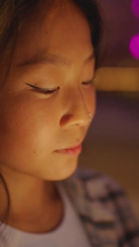 Closeup of Chinese woman's face using phone Stock Footage 287435395