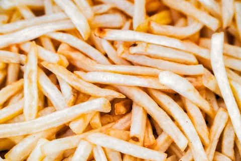 Closeup chips in fish and chips dish Stock Photos