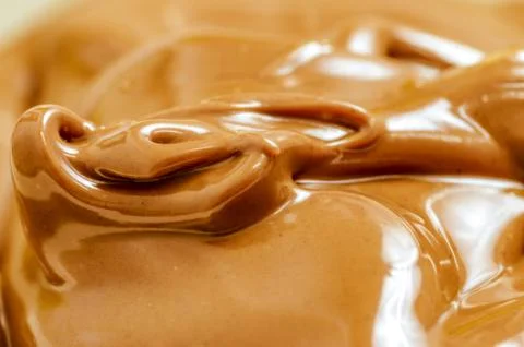 Closeup of Chocolate Spread Background Fotos Stock