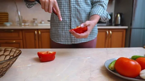 Closeup Of Chopped Red Bell Pepper On Countertop With Cooking Tools 库存影片 330025041