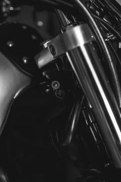 Closeup of chopper's chrome handlebar, fork, and actuator. Black and white Stock Photos