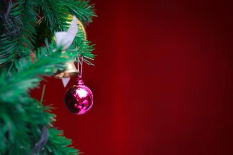 Closeup christmas ball on red background from christmas tree Stock Photos
