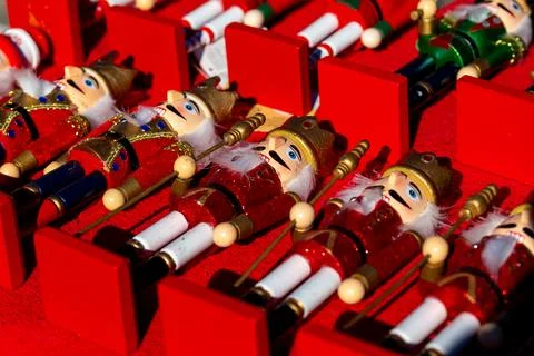 Closeup of Christmas nutcrackers in red display tray Stock Photos