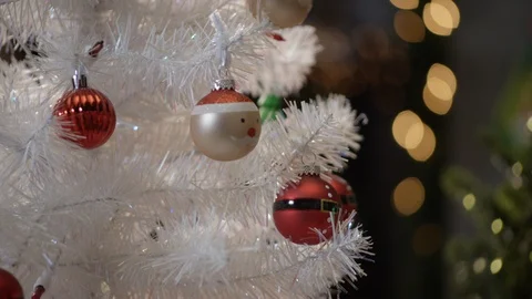 Closeup on Christmas Ornaments on White Tree Stock Footage 121817074