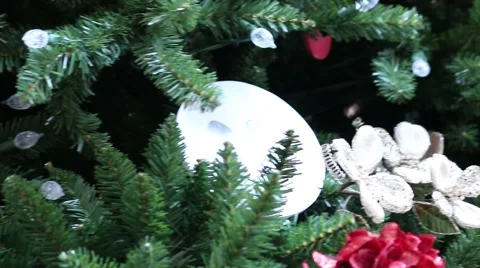 Closeup of Christmas Tree with Coca Cola Ornaments Stock Footage 44311621