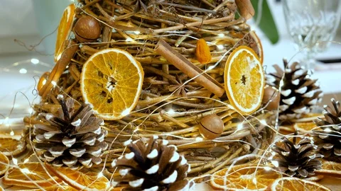 Closeup of a Christmas tree made of vine, cinnamon, anise, nuts and oranges. 4K Video stock 122245060