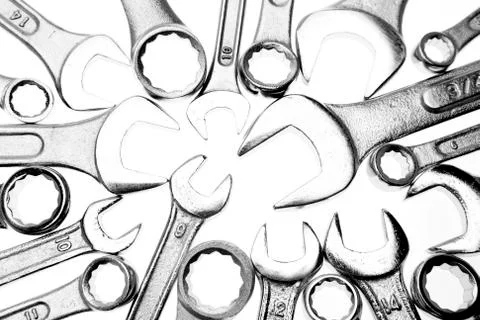 Closeup of chrome spanners on plain background Stock Photos