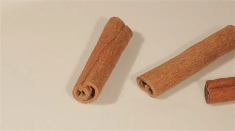 Closeup of cinnamon on white pan Stock Footage 56058786