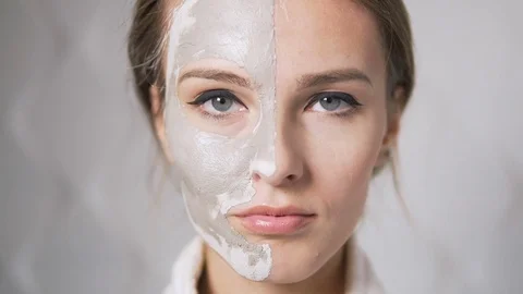 Closeup of Clay Mask on Face Видео 81756625