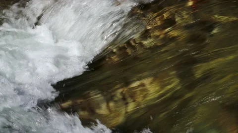 Closeup of clean clear fresh river water splashing in rapids Stock Footage 198802987