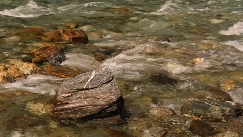 Closeup of a clear, fast-running stream, New Zealand. Stock Footage 146286753